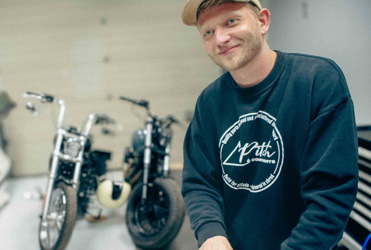 a guy wearing a branded shirt